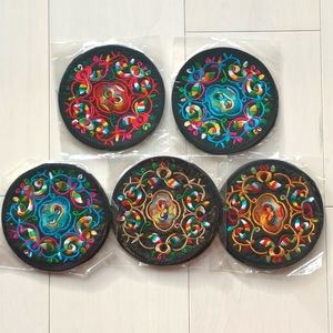 10 (5 pairs) black embroidered coasters